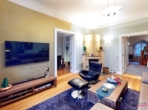 Wohnzimmer mit Kamin - Exklusives Wohn- und Geschäftshaus – Villa Hanck
